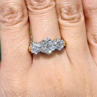 Diamond triple cluster ring in 18 carat gold