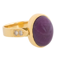 Cabochon ruby and diamond ring in 18 carat gold