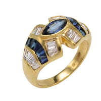 Sapphire and baguette cut diamond ring
