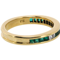 Emerald and diamond band in 18 carat gold