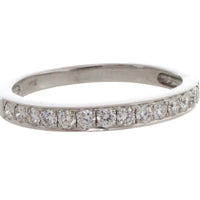 18 carat white gold band with diamonds