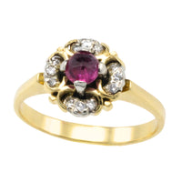 Ruby and diamond cluster ring in 18 carat gold