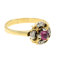 Ruby and diamond cluster ring in 18 carat gold