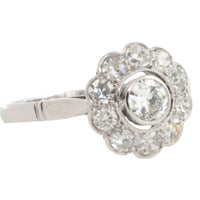 Old cut diamond cluster ring iin white gold