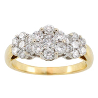 Diamond triple cluster ring in 18 carat gold