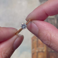 Diamond solitaire ring in yellow and white gold