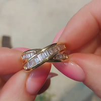 Baguette diamond crossover ring in 18 carat gold