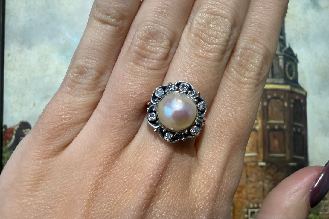 Pearl and single cut diamond ring in silver and gold