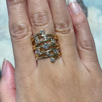 Wrap around ring bezel set with diamonds