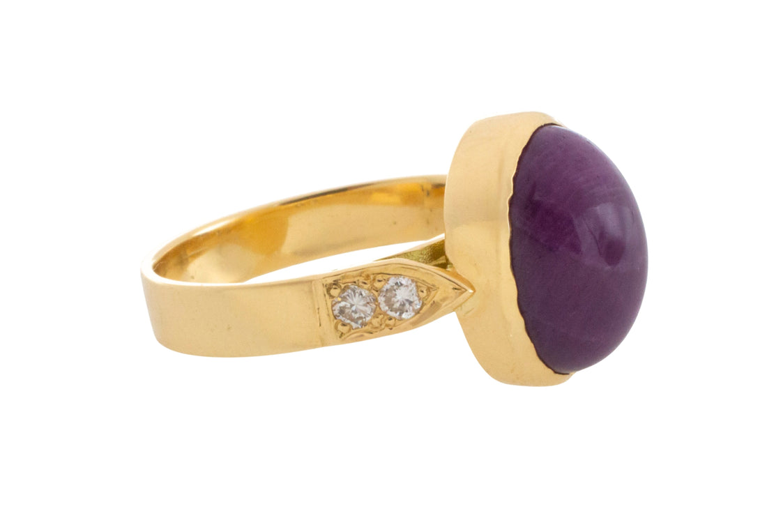 Cabochon ruby and diamond ring in 18 carat gold