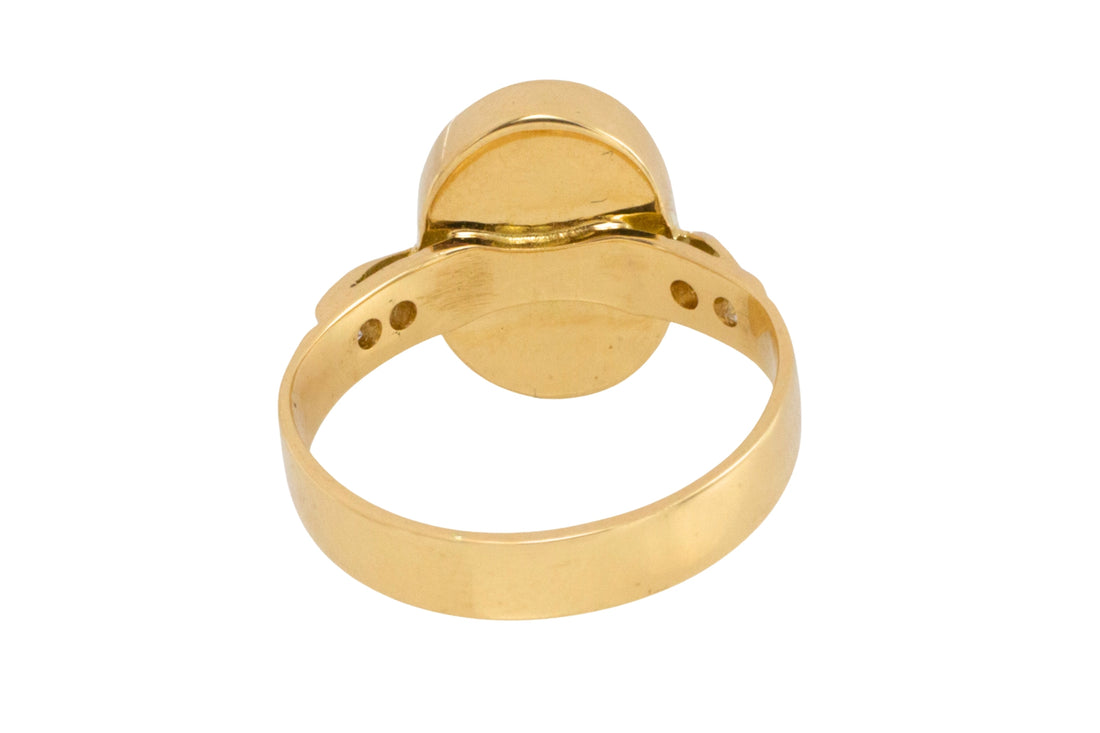 Cabochon ruby and diamond ring in 18 carat gold