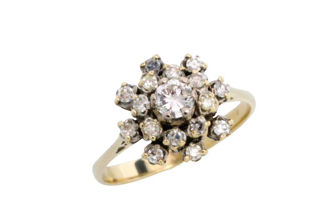 Snow flake diamond cluster ring in 14 carat gold