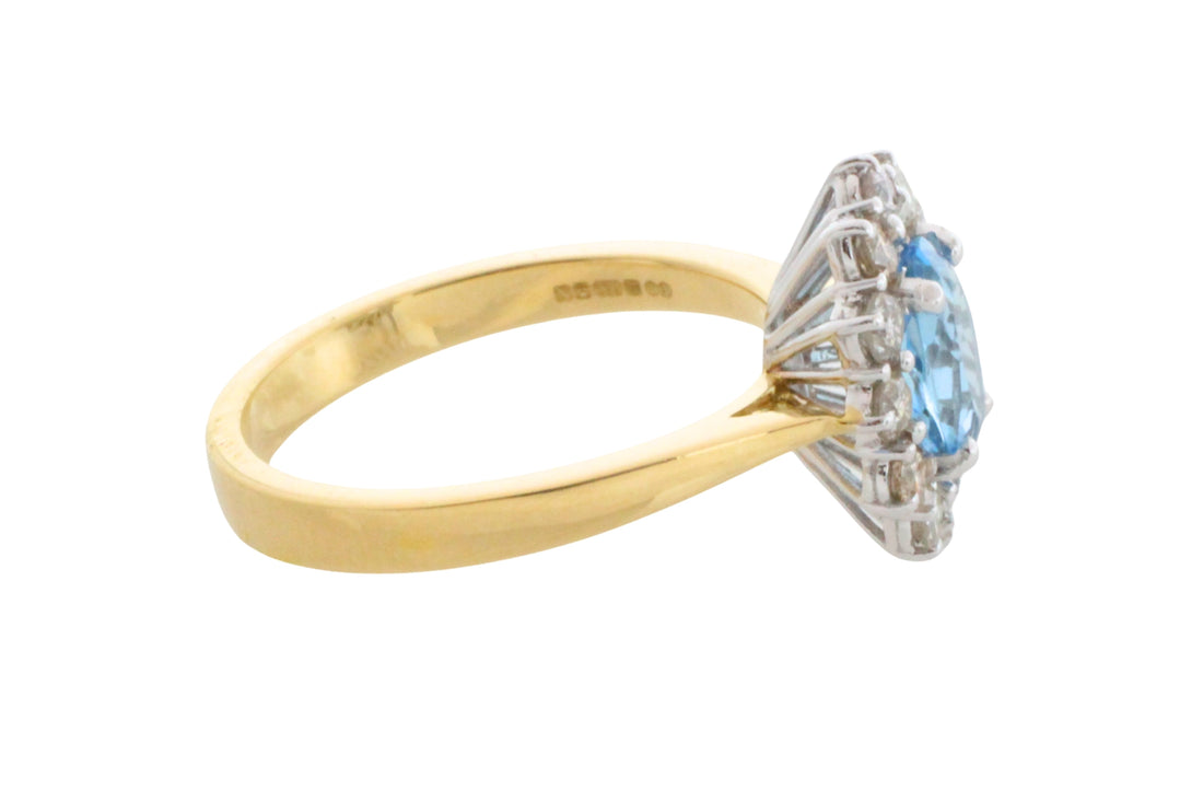 Aquamarine and diamond ring in 18 carat gold