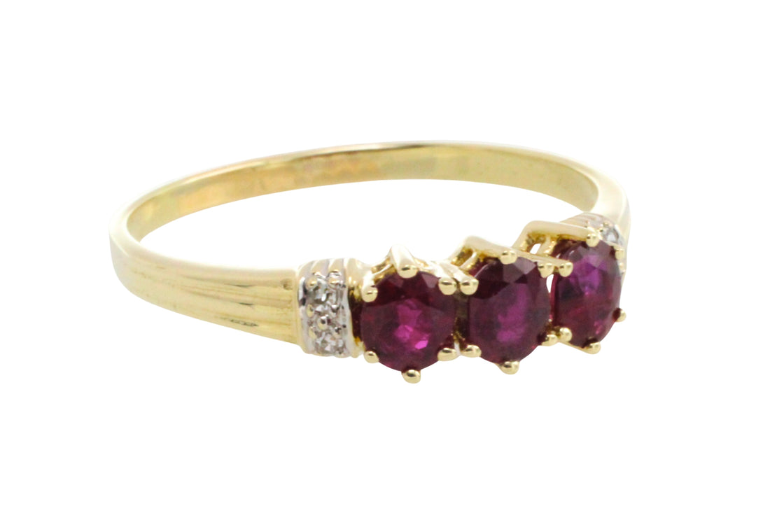 Ruby and diamond ring in 14 carat gold