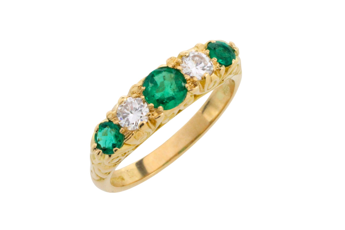 Vintage emerald and diamond ring