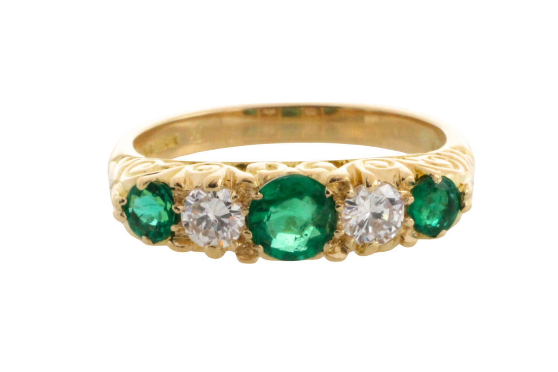Vintage emerald and diamond ring