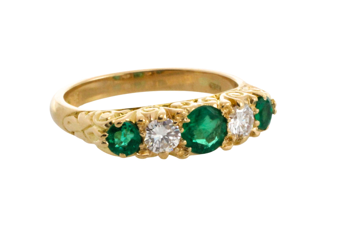 Vintage emerald and diamond ring