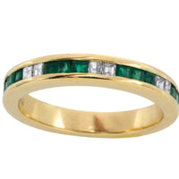 Emerald and diamond band in 18 carat gold