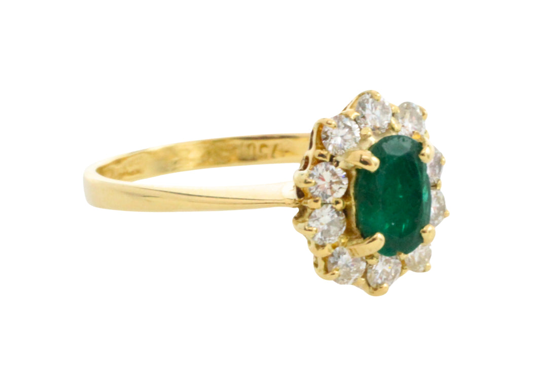 Vintage emerald and diamond ring in 18 carat gold