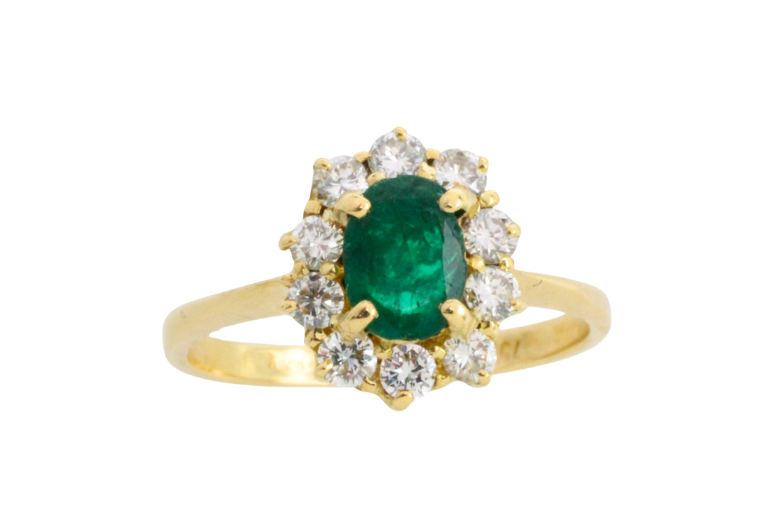 Vintage emerald and diamond ring in 18 carat gold
