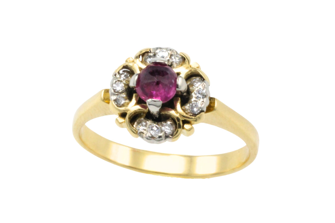 Ruby and diamond cluster ring in 18 carat gold