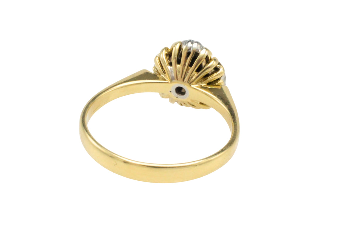 Ruby and diamond cluster ring in 18 carat gold