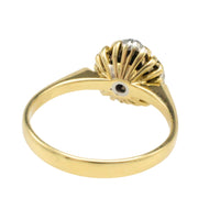 Ruby and diamond cluster ring in 18 carat gold