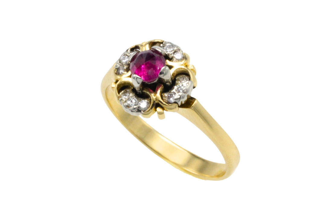Ruby and diamond cluster ring in 18 carat gold