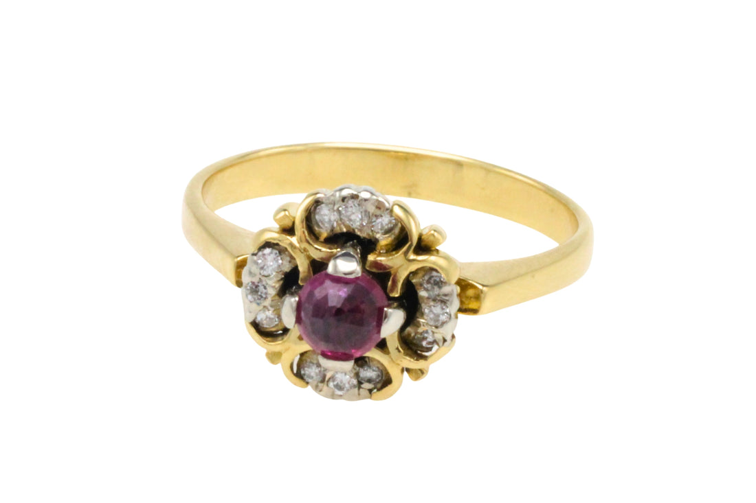 Ruby and diamond cluster ring in 18 carat gold