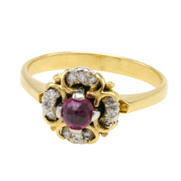 Ruby and diamond cluster ring in 18 carat gold