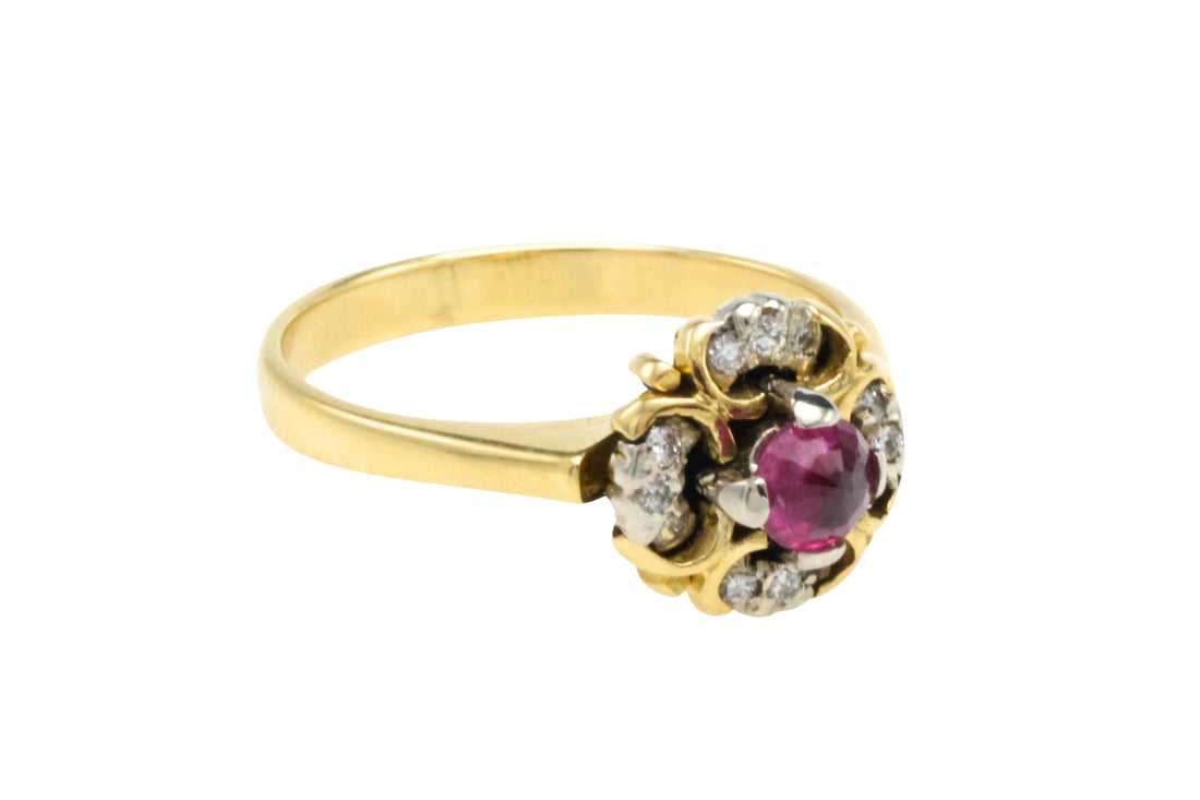 Ruby and diamond cluster ring in 18 carat gold