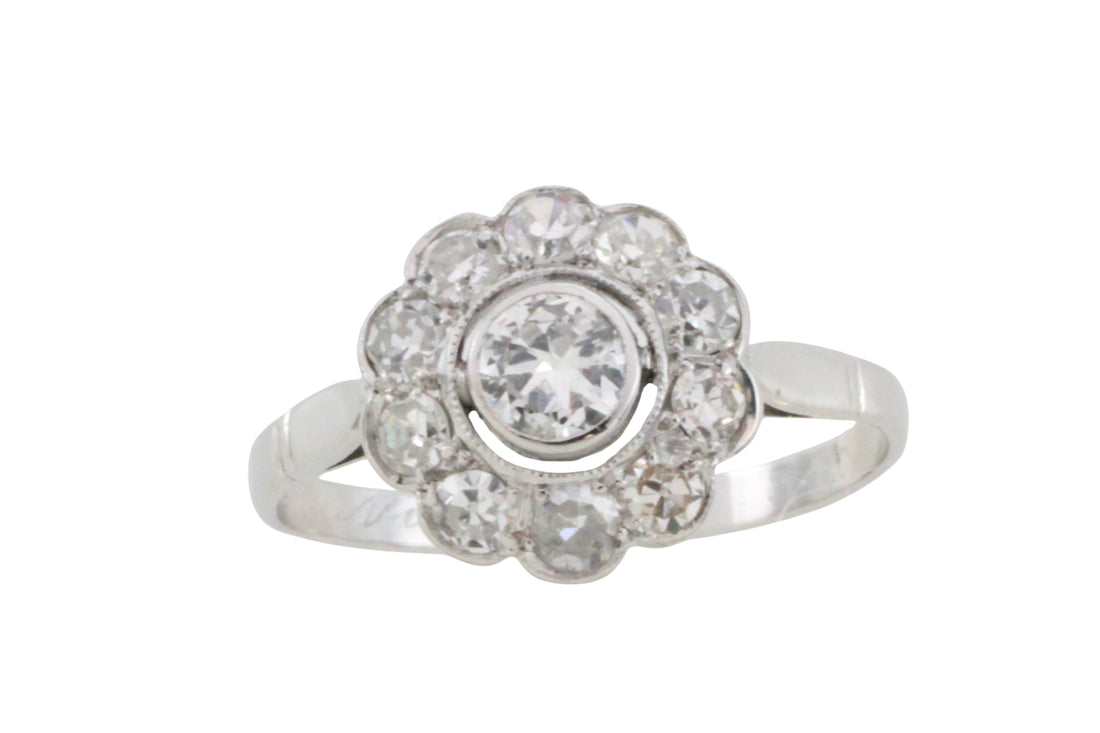Old cut diamond cluster ring iin white gold