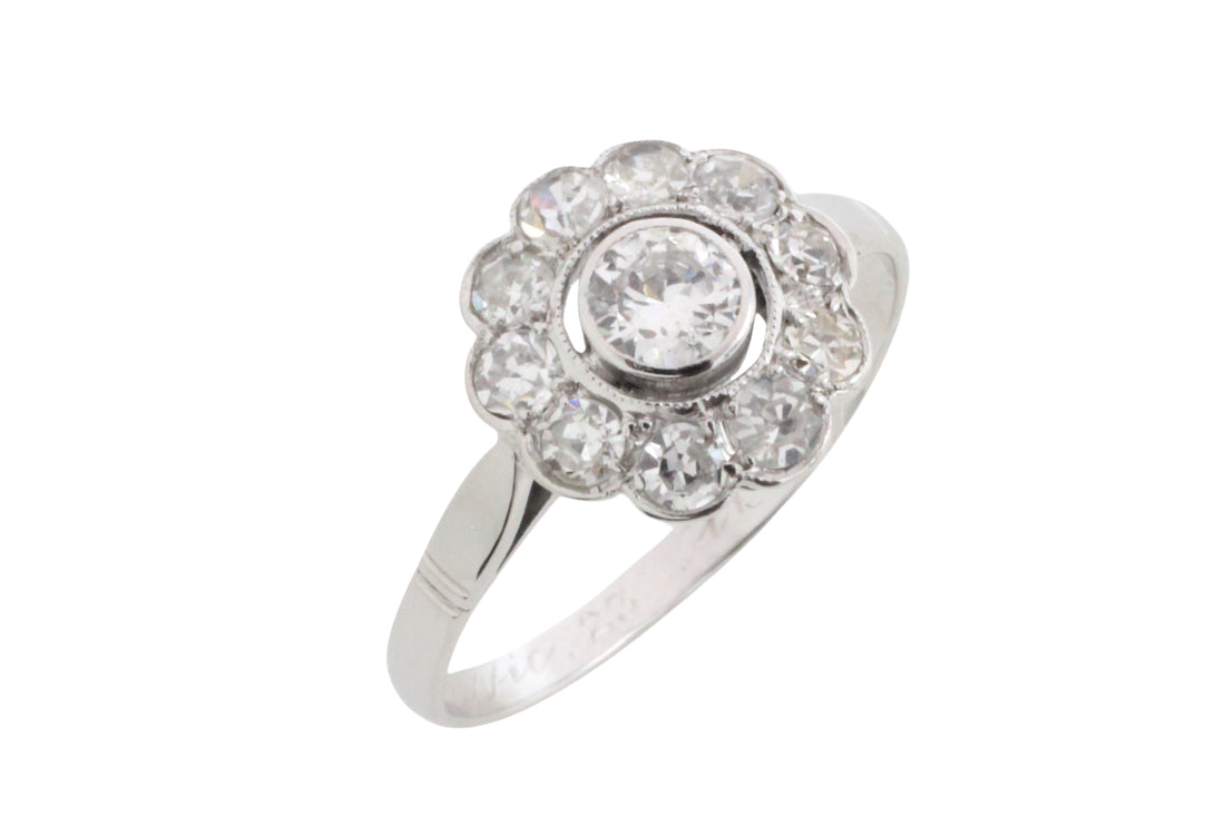Old cut diamond cluster ring iin white gold