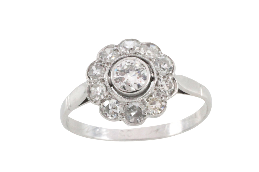Old cut diamond cluster ring iin white gold