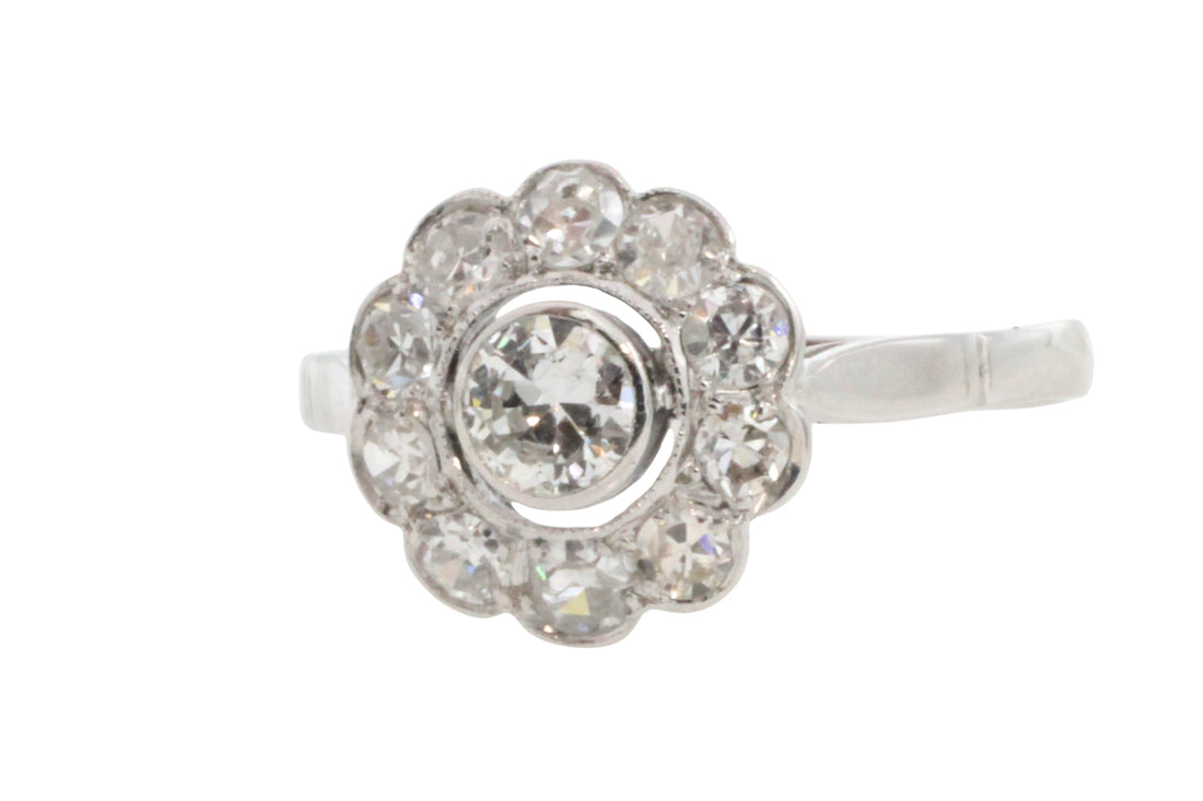 Old cut diamond cluster ring iin white gold
