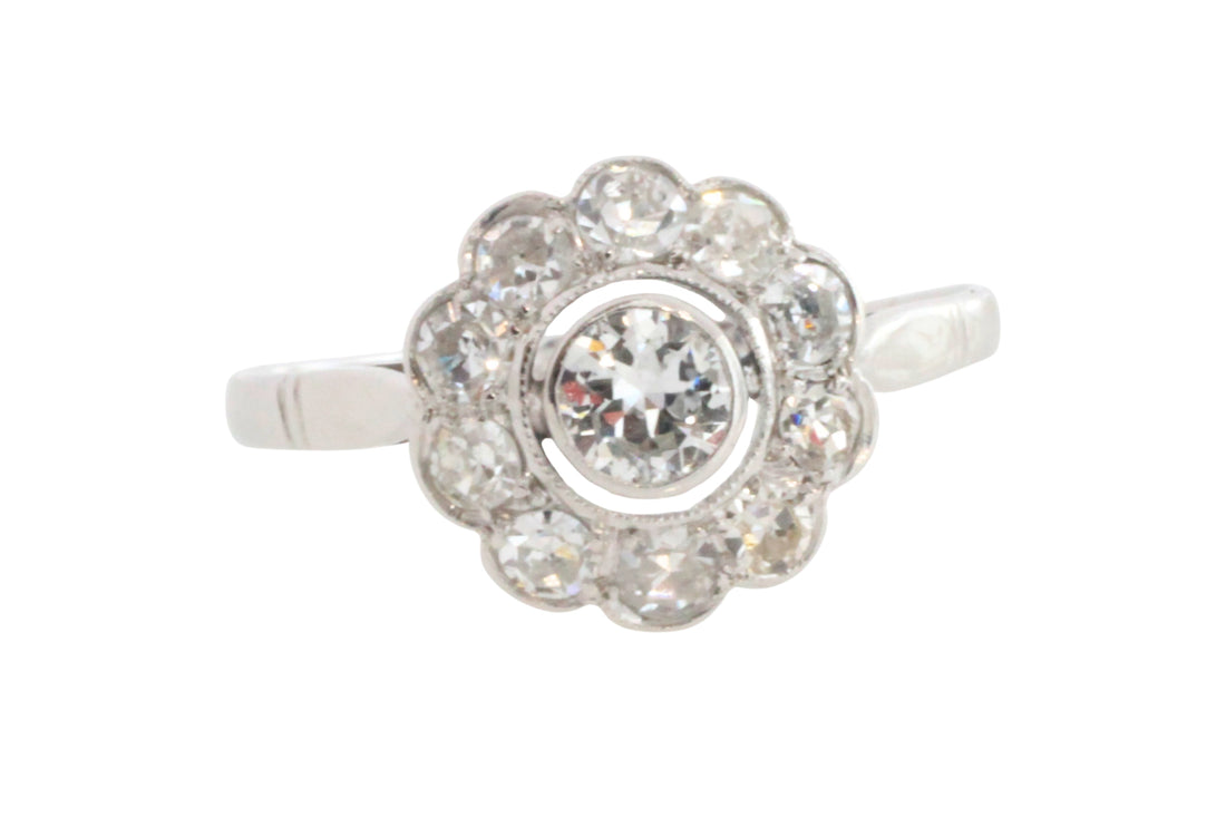 Old cut diamond cluster ring iin white gold