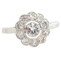 Old cut diamond cluster ring iin white gold