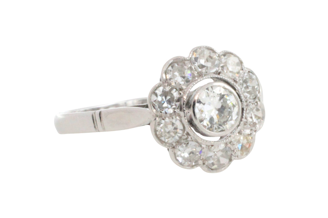 Old cut diamond cluster ring iin white gold