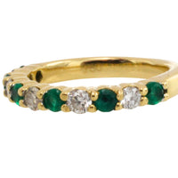 Emerald and diamond band in 18 carat gold