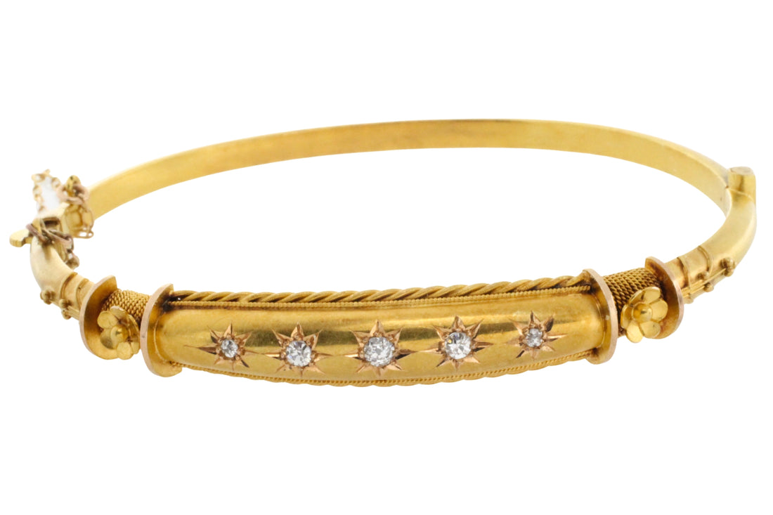 Edwardian hinged bracelet with old cut diamonds