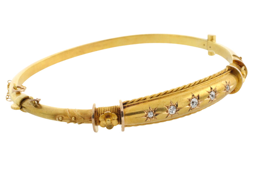 Edwardian hinged bracelet with old cut diamonds