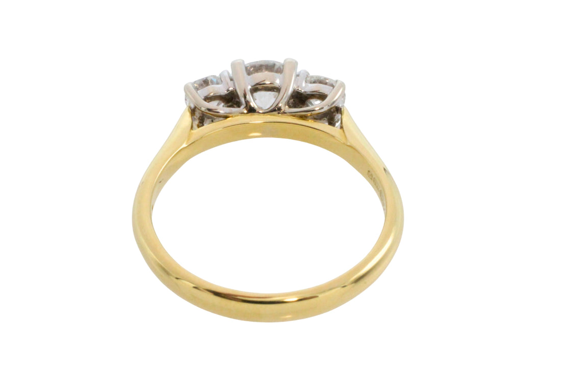 Three stone brilliant cut diamond ring