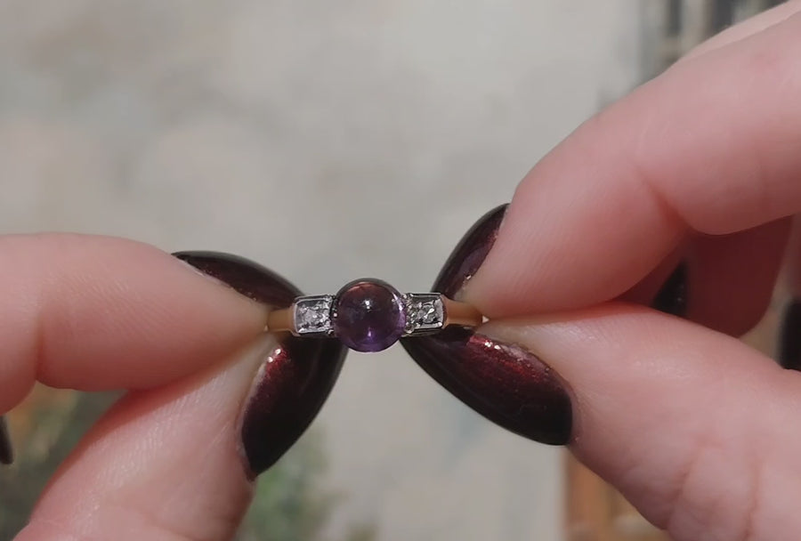 Cabochon amethyst ring with diamonds