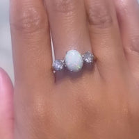 Vintage cabochon opal and brilliant cut diamond ring