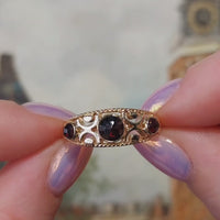 Garnet filigree ring in 14 carat gold