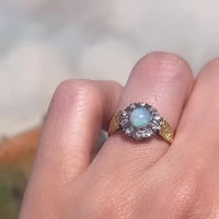 Opal and diamond ring in 18 carat gold