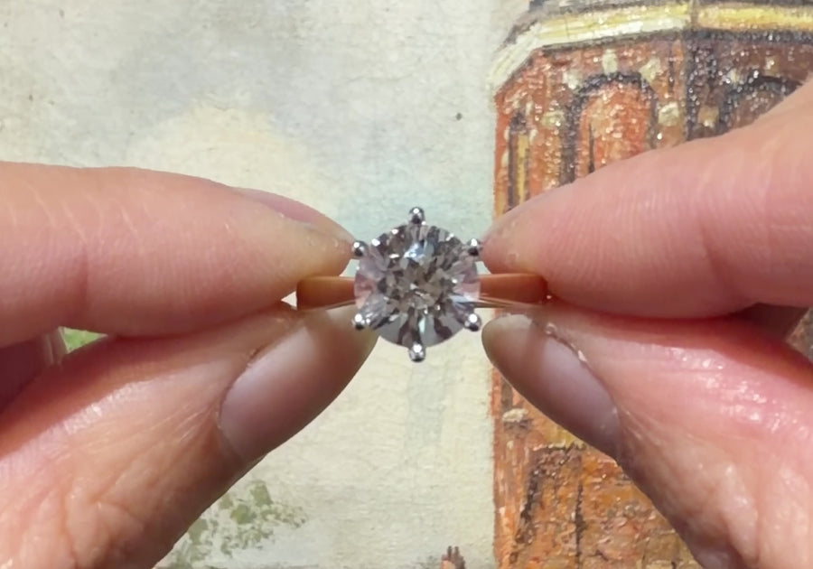 Gold solitaire ring with rock crystal stone