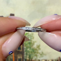 18 carat gold half eternity band with diamonds