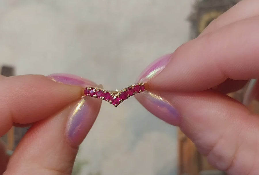 Ruby wish bone ring in 18 carat gold