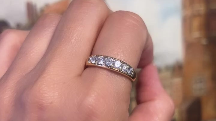 Seven stone diamond ring in 18 carat gold